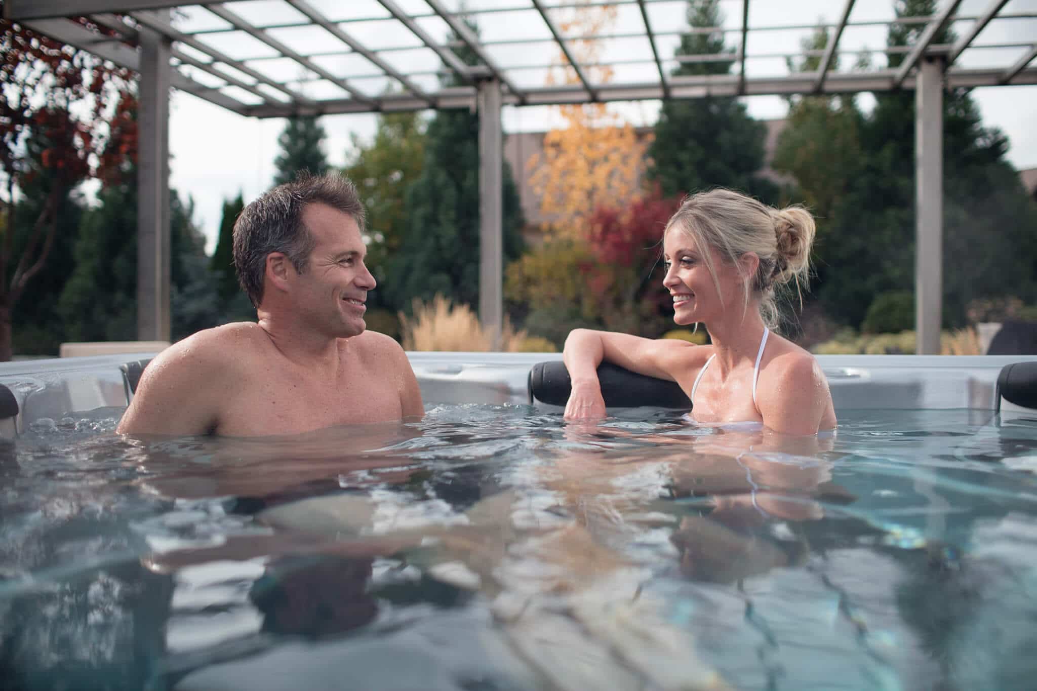 relaxing in a hot tub with spouse