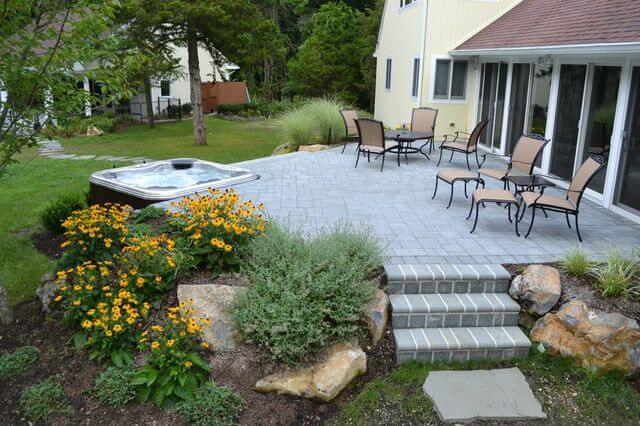 Deck with Brick Pavers and Hot Tub