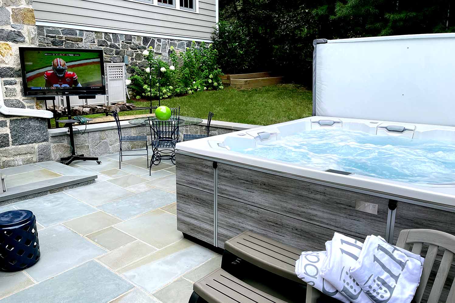 outdoor tv with hot tub