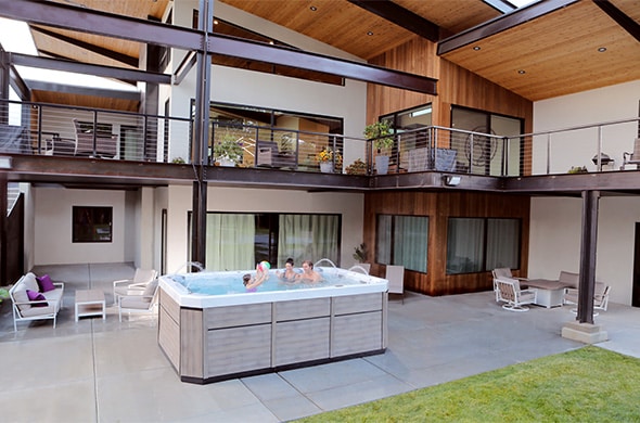 Family playing in Swim Spa
